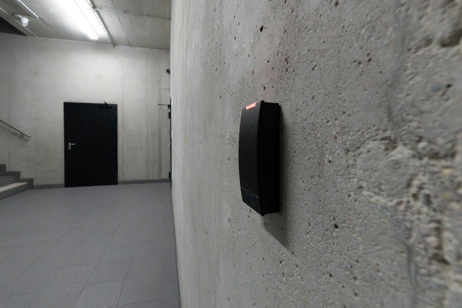 Card access reader beside a door