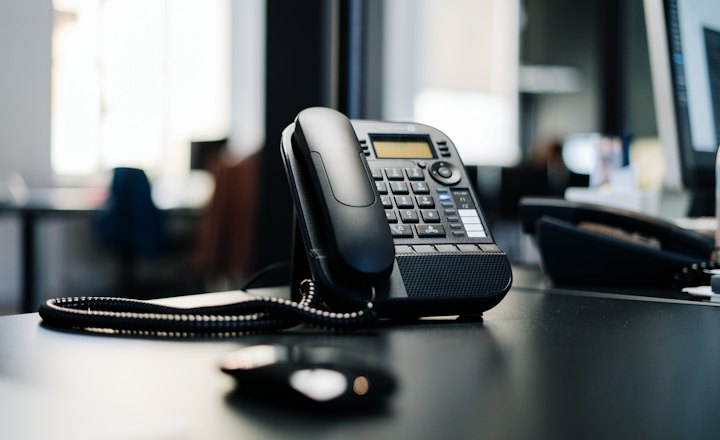 IP desk phone on an office desk